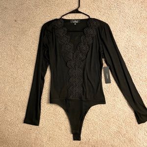 Lulu’s Black Lace Long Sleeve Bodysuit